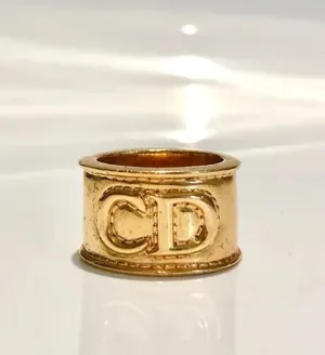 1980s CHRISTIAN DIOR GOLD TONE METAL SCARF RING