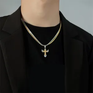 Double layered snake bone layered gold and silver cross necklace
