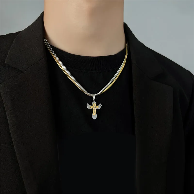 Double layered snake bone layered gold and silver cross necklace